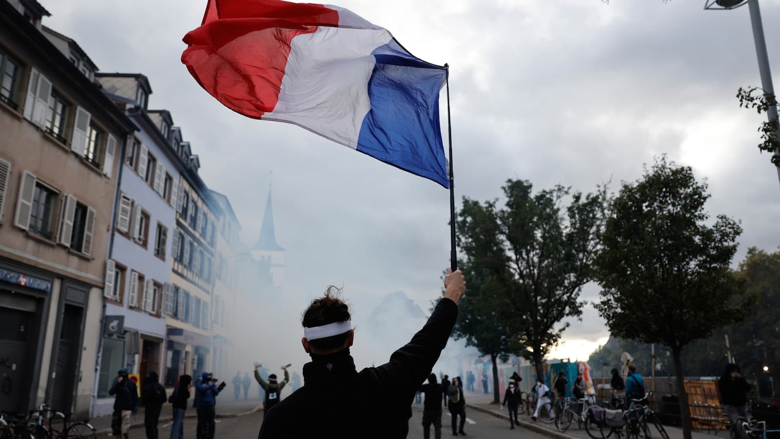 More than 400,000 protest across France, challenging Macron as Paris clashes erupt