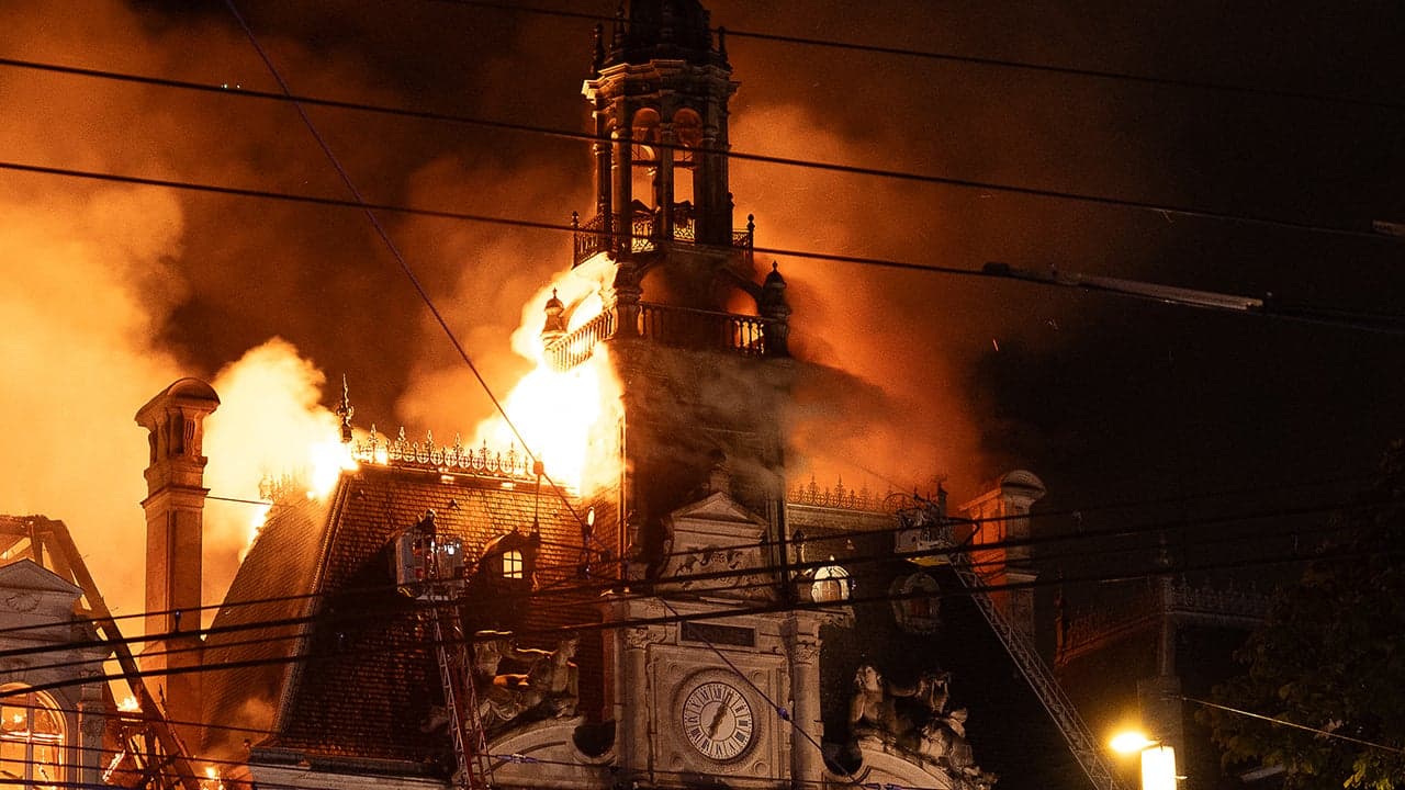 'Far-left activist' arrested in France after city hall set on fire amid ongoing protests