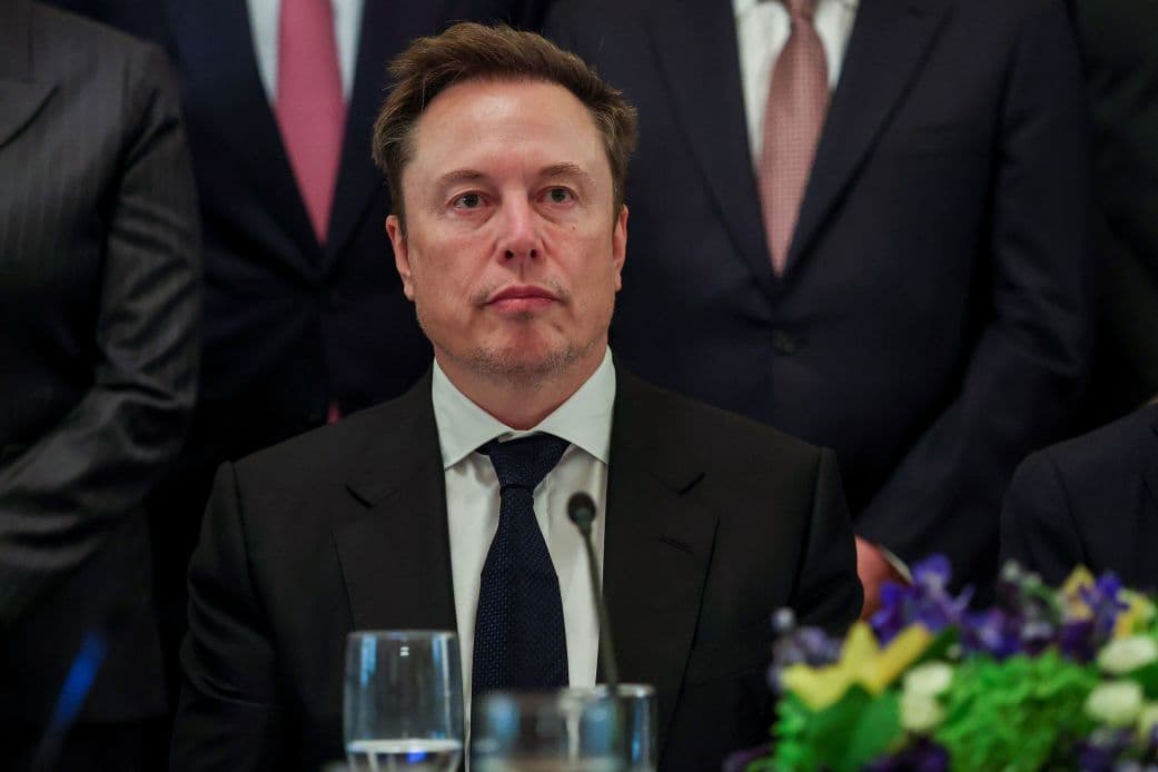 Elon Musk attends a meeting on artificial intelligence in the East Room of the White House on September 29.